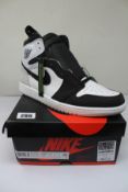 A boxed as new pair of Nike Air Jordan 1 Retro High OG White/Bleached Coral-Black (Size UK 10) (