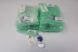 Twelve as new Woodstock Chimes Crystal Sunrise Cascade Sun-Catchers in Purple (EAN: 028375270118).