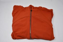 A Lululemon activewear hooded define jacket (Size XS/S).