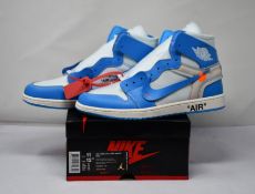 A pair of boxed as new Nike Jordan 1 X Off-White NRG white/DK powder blue cone, to include one white