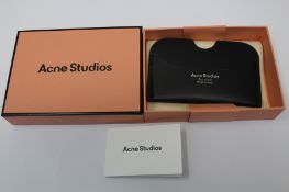 A boxed as new Acne Studios Leather Card Holder in Black.