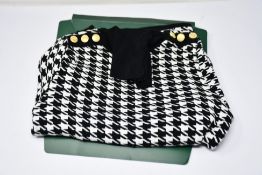 A women's Holland Copper classic roll neck jumper gold button detail to sleeves and shoulders (