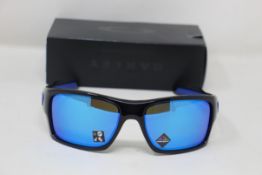 A boxed as new pair of Oakley Turbine Sunglasses in Black Ink with Prizm Sapphire Lens (REF: OO9263,