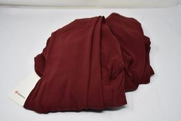 Three pairs of LuLuLemon Groove Pant SHR flares (Size 2 x 6, 1 x 8) (Security tags attached).