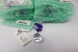 Twelve as new Woodstock Chimes Crystal Sunrise Cascade Sun-Catchers in Purple (EAN: 028375270118).