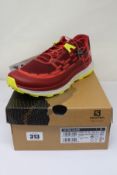 A pair of boxed as new Salomon Ultra Glide Trail Running Shoes in Biking Red/Lunar Rock/Evening
