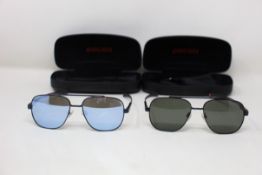 Two pairs of Ducati pilot sunglasses (DA7023) (002 56 16-145) and (696 56 16-145).