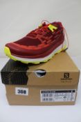 A pair of boxed as new Salomon Ultra Glide Trail Running Shoes in Biking Red/Lunar Rock/Evening