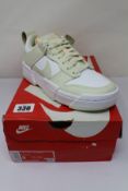 An as new pair of women's Nike Dunk Low Disrupt in White/Sea Glass (Size UK 5.5) (Box damaged).