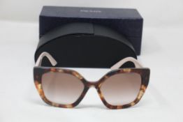 A boxed as new pair of Prada Gradient Butterfly Sunglasses in Caramel Tortoise (REF: PR 24XS, EAN:
