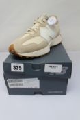 A pair of as new New Balance 327 Trainers in Oatmeal and White (Size UK 8) (Box has some damage).