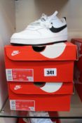 Two pairs of boxed as new Nike Court Borough Low 2 (GS) in black and white (UK 5/5.5Y).