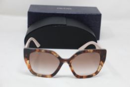 A boxed as new pair of Prada Gradient Butterfly Sunglasses in Caramel Tortoise (REF: PR 24XS, EAN: