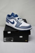 A pair of as new Nike Air Jordan 1 low trainers (UK 10).