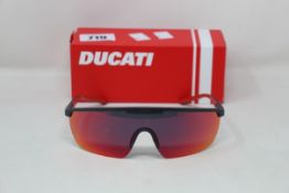 A pair of Ducati sunglasses (DA025) (932 139 0-120).