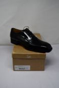 A pair of as new Christian Louboutin Capitano flat black lack up Oxford dress loafers (Size 45) (RRP
