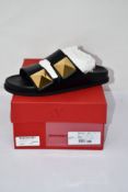 A pair of pre-owned Valentino Garavani Black Leather Slides (EU 40, as new condition but some