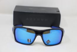 A boxed as new pair of Oakley Turbine Sunglasses in Black Ink with Prizm Sapphire Lens (REF: OO9263,