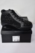 A pair of Kurt Geiger London Laney Stud Hi Top trainers (Size 42).