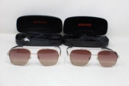 Two pairs of Ducati pilot sunglasses (DA7023) (400 56 16-145).