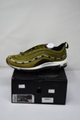 A pair of as new Nike Air Max 97/undftd with authenticity tag (UK 9).