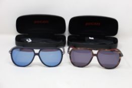 Two pairs of Ducati single spring hinge pilot sunglasses (DA023) (488 58 12-140) and (651 58 12-