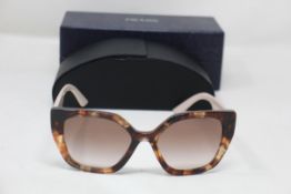 A boxed as new pair of Prada Gradient Butterfly Sunglasses in Caramel Tortoise (REF: PR 24XS, EAN: