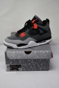 A pair of Nike Air Jordon 4 Retro 2022 dark Grey/infrared 23-black (Size UK 7.5).