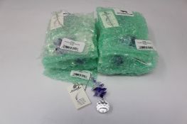 Twelve as new Woodstock Chimes Crystal Sunrise Cascade Sun-Catchers in Purple (EAN: 028375270118).