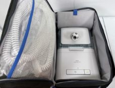 An as new Philips DreamStation CPAP Pro (GBX400H15) with Humidifier (EUXH), UK Power Adaptor, tubing