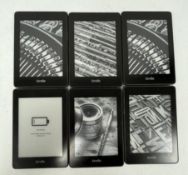 Six pre-owned Amazon Kindle Paperwhite 10th Gen E-Readers (M/N: PQ94WIF) (Grade B/C).