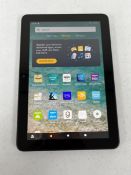 A pre-owned Amazon Fire HD 8 10th Gen 32GB Tablet in Black (M/N: K72LL4) (Grade B).