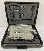 A pre-owned SMC Pneumatics Advanced Spinal Mobilization Instrument (ASMI) Machine in custom foam lin