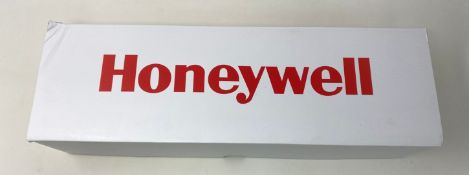 A boxed as new Honeywell CT40-NB 4-Slot Docking Station with PSU and EU power cable included (P/N: C