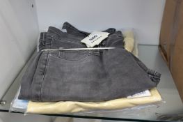 Four as new Sandro clothing items to include three shirts and a pair of jeans.