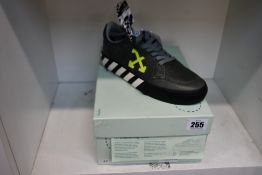 A pair of Off-White Low Vulcanised Sneakers in Grey/Green/Fluo (UK Size 5).