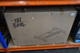 A TatSoul Oros 680LE client chair base.