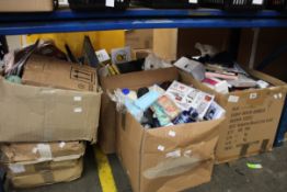 Four boxes full of miscellaneous small items to include supplements and greetings cards.