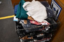 A basket full of miscellaneous as new clothing to include Carhartt, Iris & Ink, Kronstadt and