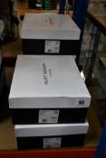 Five pairs of boxed as new Kurt Geiger London Laney Eagle Slip-On Studded Trainers in black (EU