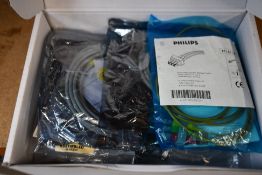 A box of assorted cables for medical equipment to include Philips and Datex-Ohmeda.