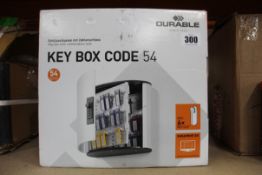 A Durable Key Box Code 54 with combination lock and slot.