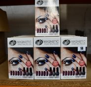 Twenty eight boxed Rio Magnetic Magic nail polish kits.