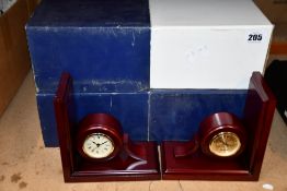 Four thermometer weather clock bookends.