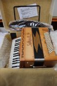An as new Saltarelle Cleggan 72 Bass Piano Accordion (With case).