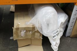 Three rolled-up mattresses.