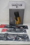 Seven assorted Sabatier knives and a Sabatier 8-piece knife wooden block (Over 18s only).