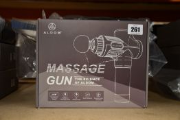 Four Aldom Massage Guns.