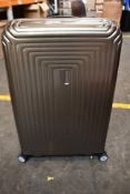 An as new Samsonite Neopulse Spinner 75/28 in Metallic Sand.