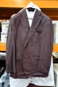 A Clement & Church brown bespoke two piece brown flex suit and shirt (Size Unknown).